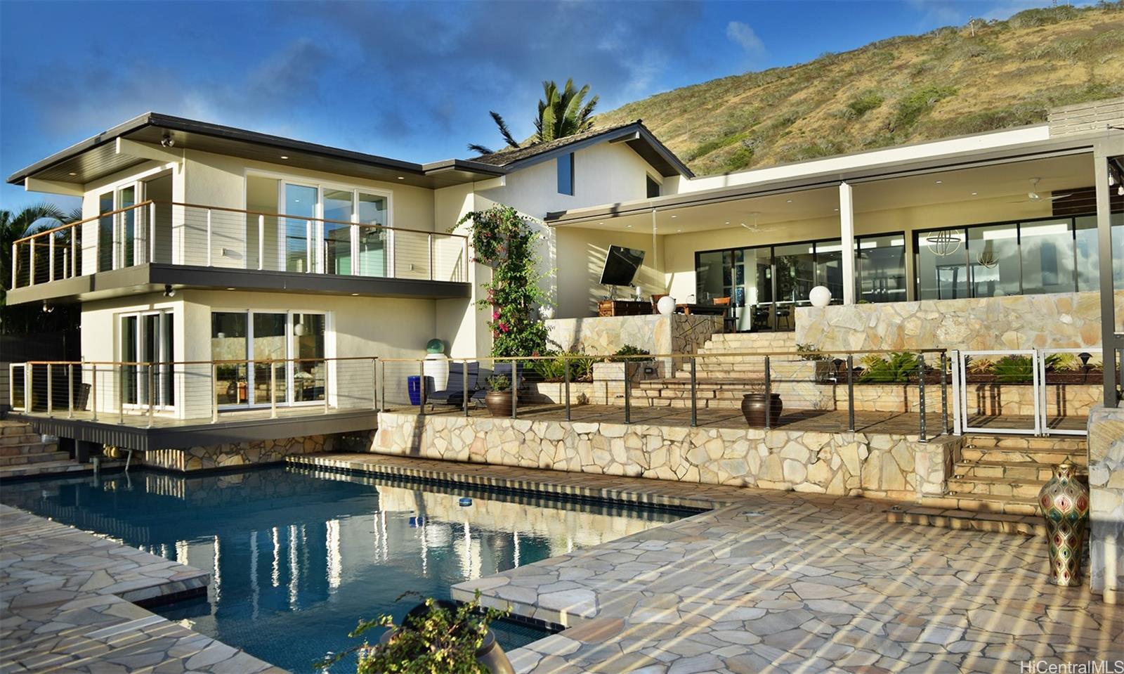 a front view of a house with swimming pool