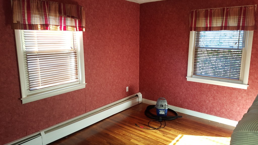 4 Sovereign Heights Sutton, MA 01590 - Photo 10 of 16 a room with window and a wooden floor