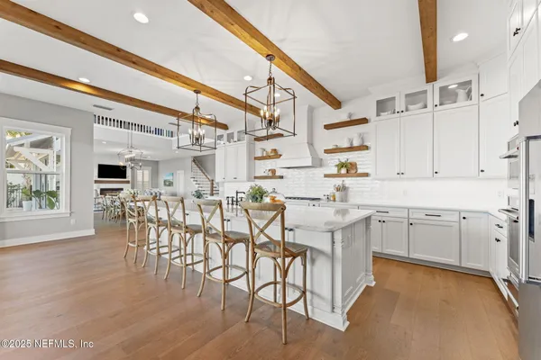 a living room with fireplace furniture and a flat screen tv