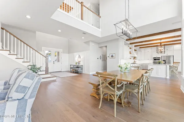 a bedroom with a bed and a table