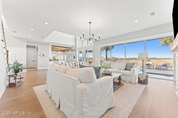 a view of living room with furniture and fireplace