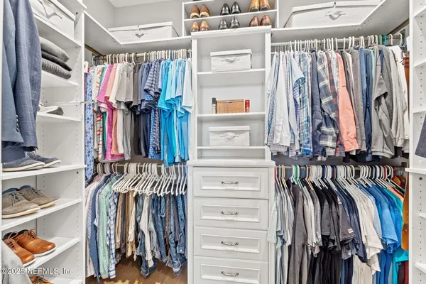 a swimming pool with outdoor seating and yard