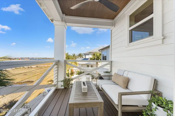 a view of a swimming pool and lounge chair