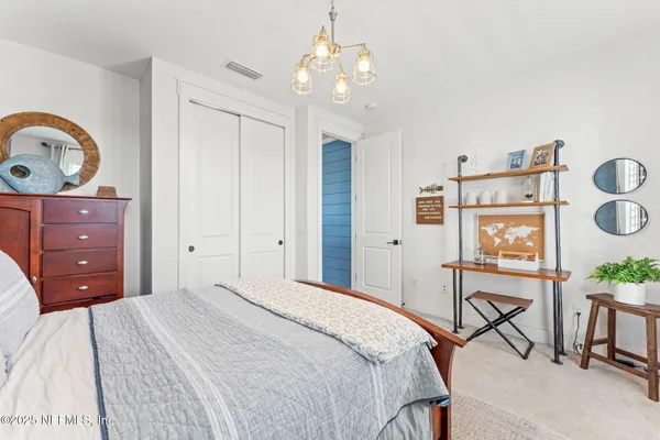 a view of a swimming pool with outdoor seating and city view