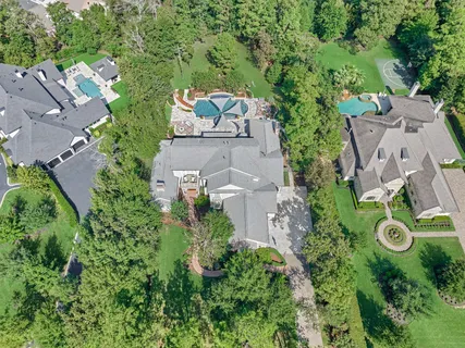 an aerial view of multiple house with outdoor space