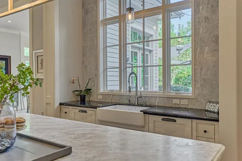 a spacious bathroom with sink and bathtub