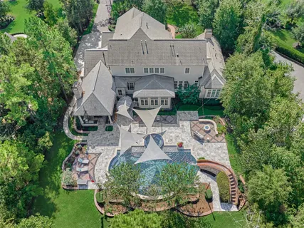 an aerial view of a house with garden space sitting space and barbeque oven