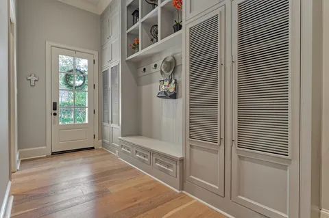 a kitchen with stainless steel appliances granite countertop a refrigerator and cabinets