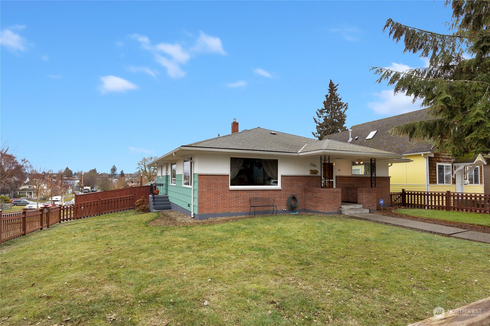 2101 Rockefeller Avenue Everett, WA 98201 - Photo 23 of 26 a view of a house with a yard and sitting area