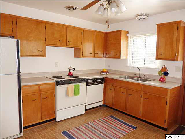 110 Elkhorn Road Charlottesville, VA 22903 - Photo 5 of 17 Eat-in kitchen has a door to the side patio.