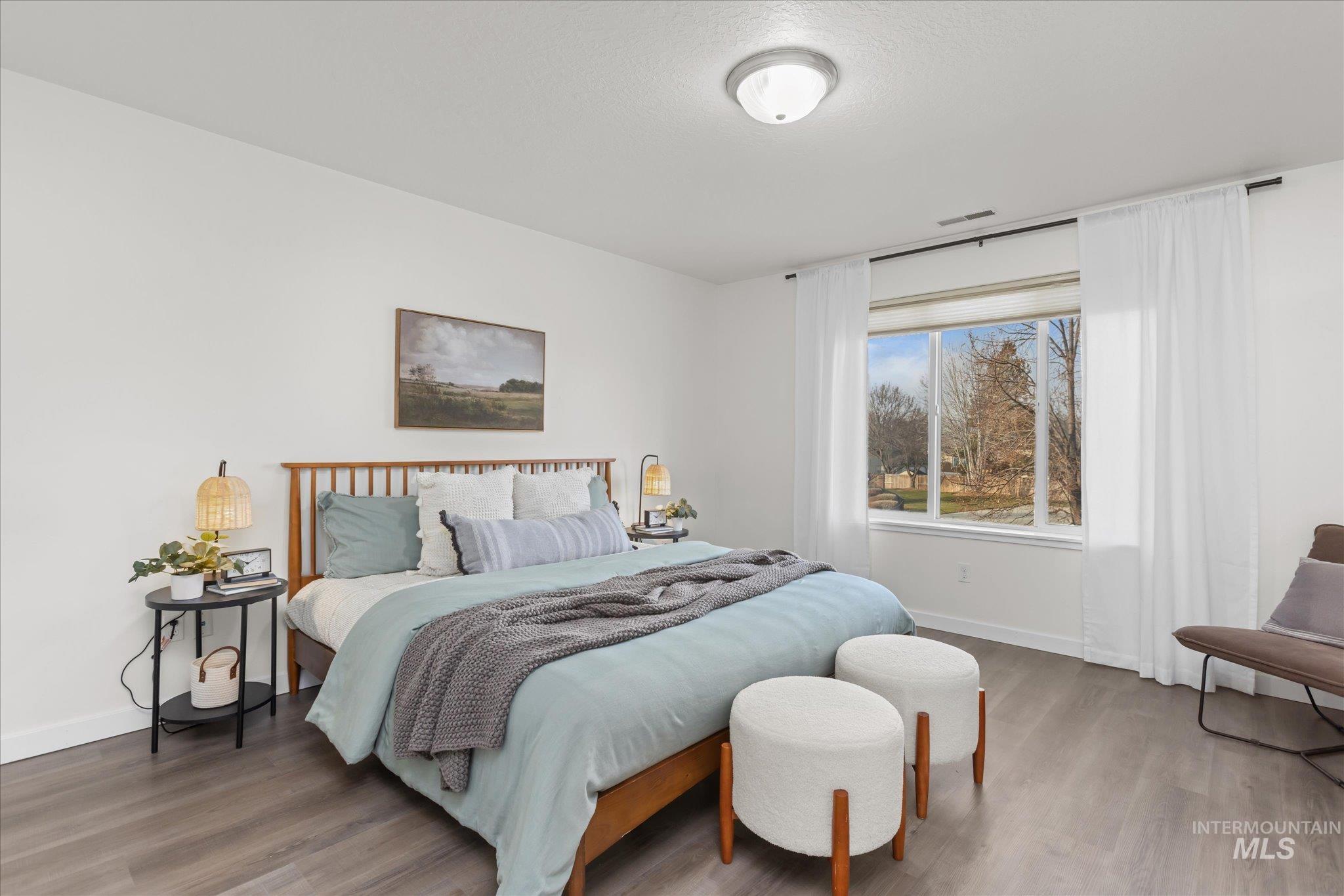 1885 North Justin Avenue Meridian, ID 83646 - Photo 17 of 27 Bedroom with wood finished floors
