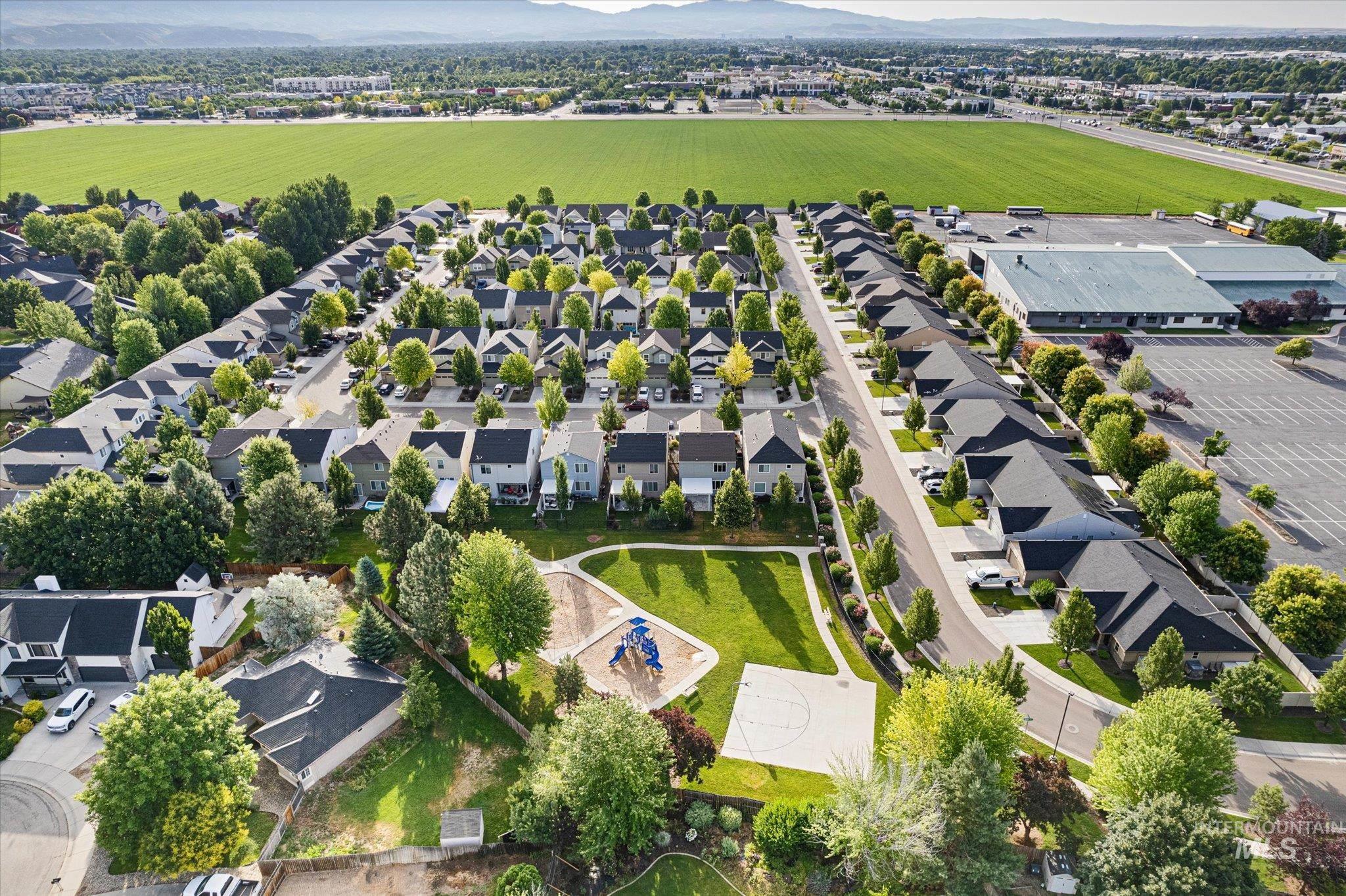 1885 North Justin Avenue Meridian, ID 83646 - Photo 27 of 27 Aerial perspective of suburban area featuring a mountainous background