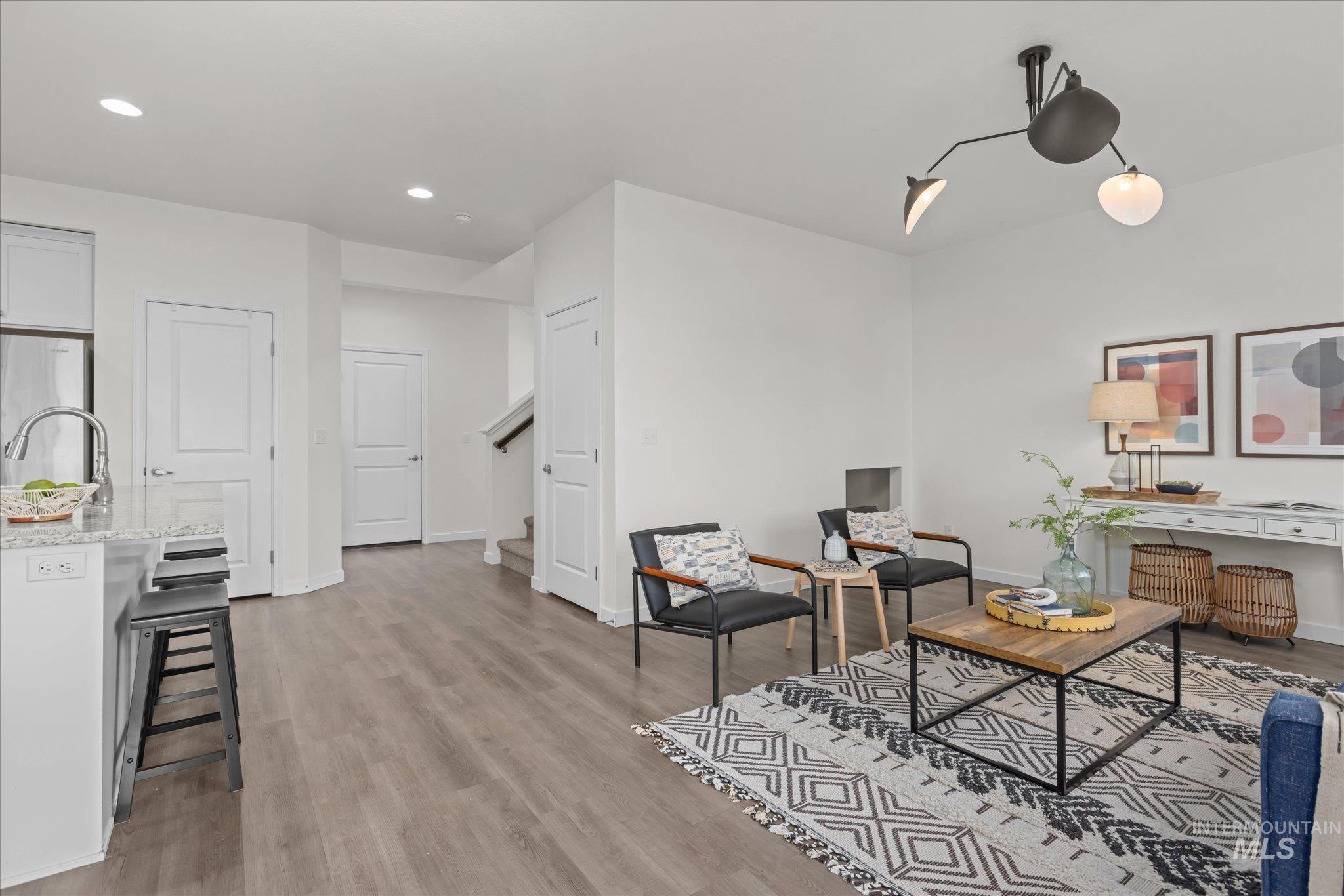 1885 North Justin Avenue Meridian, ID 83646 - Photo 7 of 27 Living room featuring light wood finished floors and recessed lighting