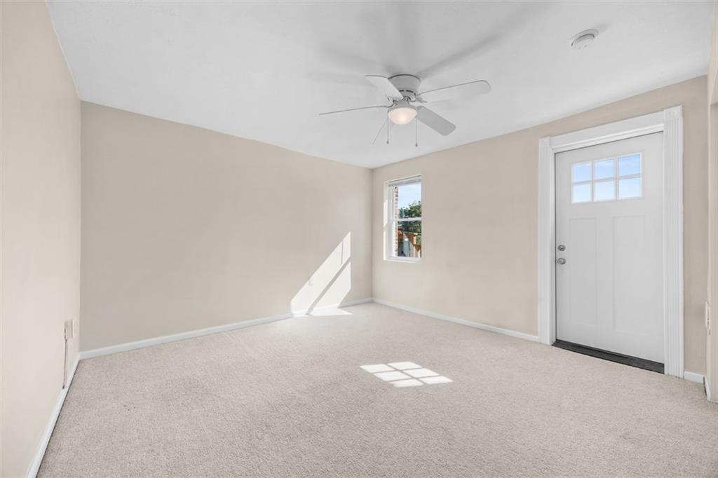 1312 Boyle Street Pittsburgh, PA 15212 - Photo 27 of 50 a view of an empty room with a window