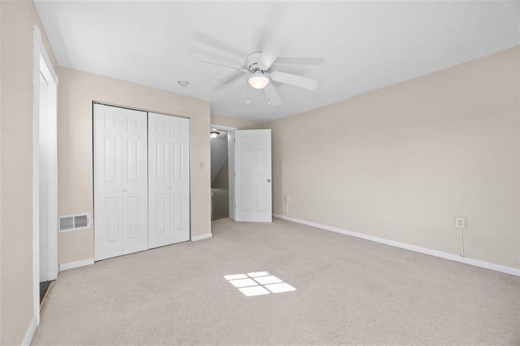 1312 Boyle Street Pittsburgh, PA 15212 - Photo 28 of 50 a view of an empty room and a ceiling fan