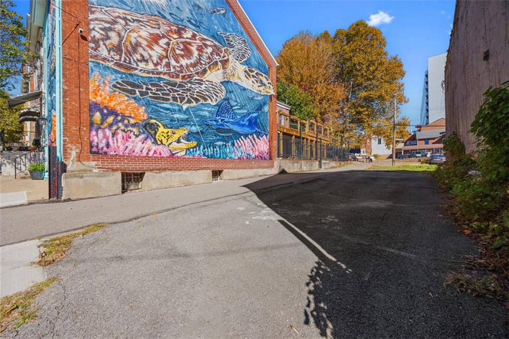 1312 Boyle Street Pittsburgh, PA 15212 - Photo 41 of 50 a street view with large trees