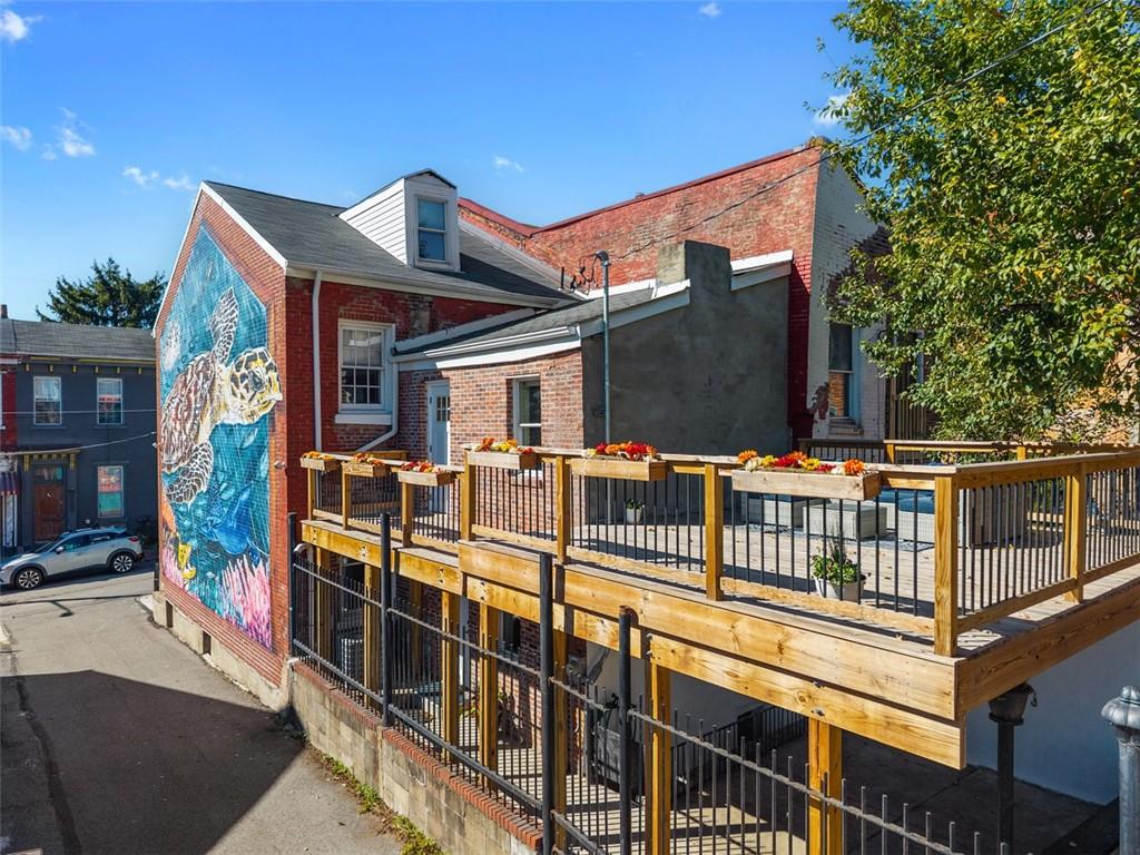 1312 Boyle Street Pittsburgh, PA 15212 - Photo 6 of 50 a view of a building with large windows