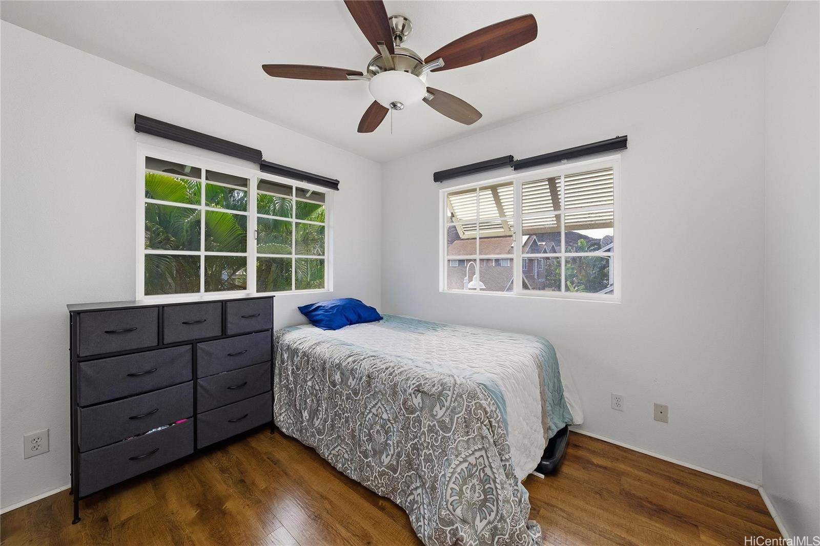 87-1958 Pakeke Street, Unit T Waianae, HI 96792 - Photo 19 of 25 a bed room with a bed and a window