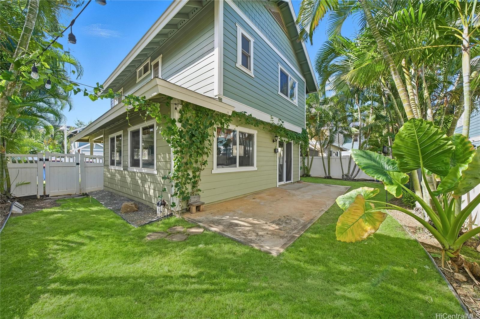 87-1958 Pakeke Street, Unit T Waianae, HI 96792 - Photo 22 of 25 a view of a house with a yard and sitting area