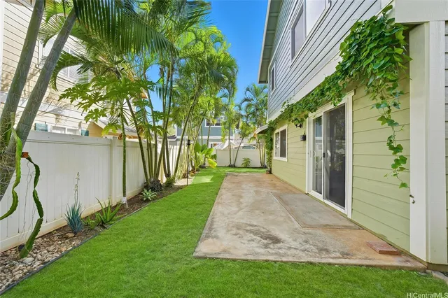 a view of a back yard of the house