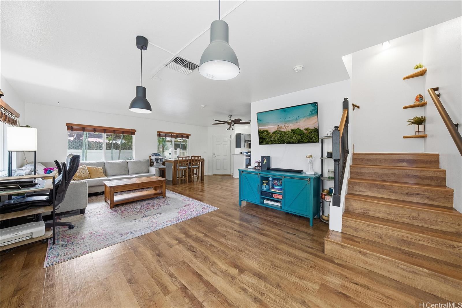 87-1958 Pakeke Street, Unit T Waianae, HI 96792 - Photo 8 of 25 a living room with furniture and a flat screen tv