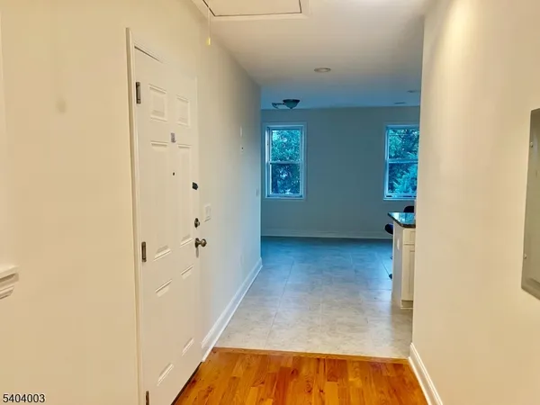 a view of a room with white walls