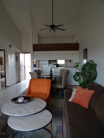 a kitchen with a table chairs and a stove