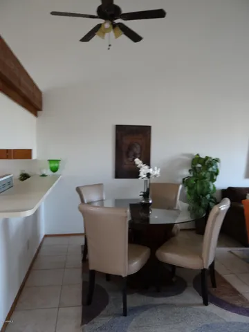 a view of a dining room with furniture