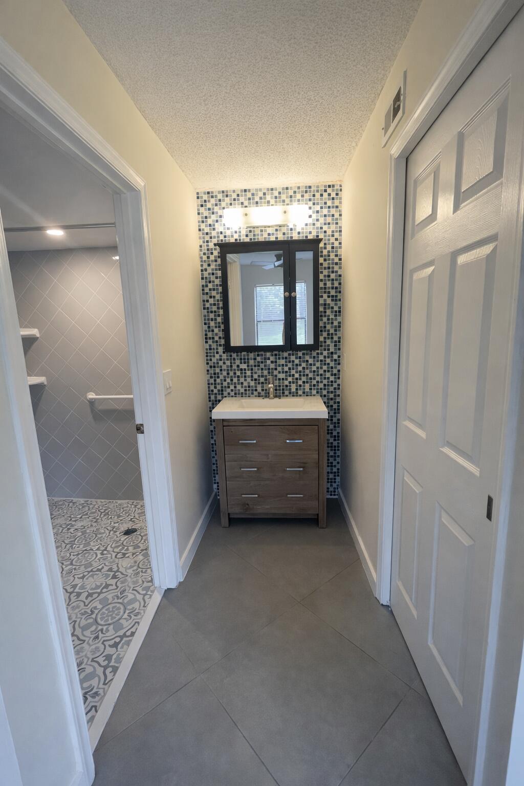 3355 Jaywood Terrace, Unit J113 Boca Raton, FL 33431 - Photo 11 of 34 a view of livingroom with furniture and front door