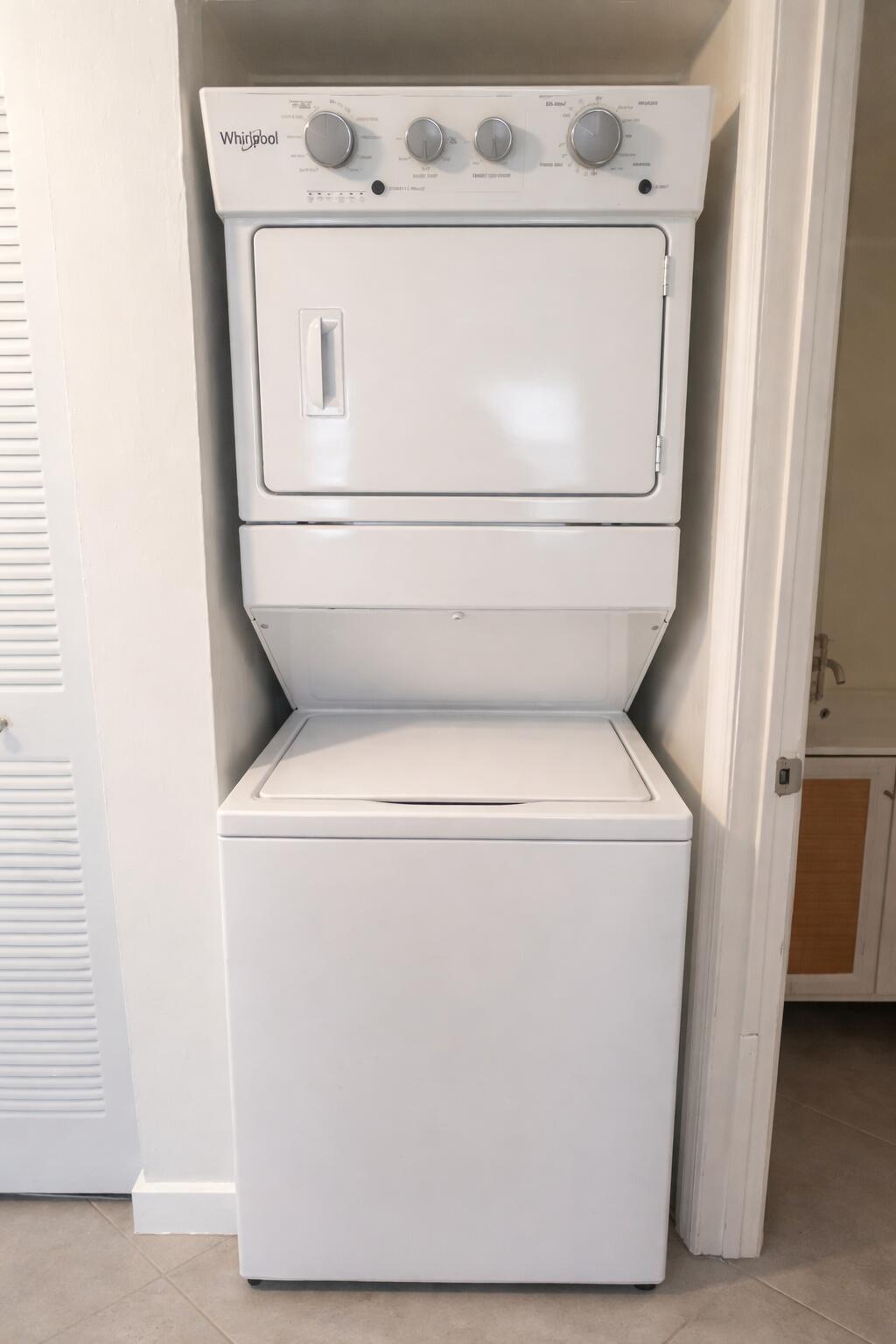 3355 Jaywood Terrace, Unit J113 Boca Raton, FL 33431 - Photo 18 of 34 a utility room with dryer and washer