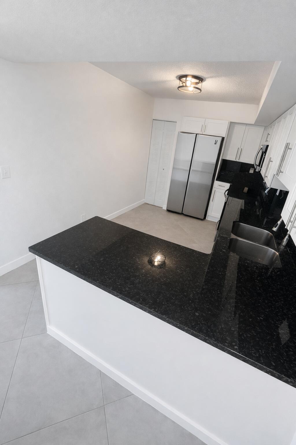 3355 Jaywood Terrace, Unit J113 Boca Raton, FL 33431 - Photo 3 of 34 kitchen