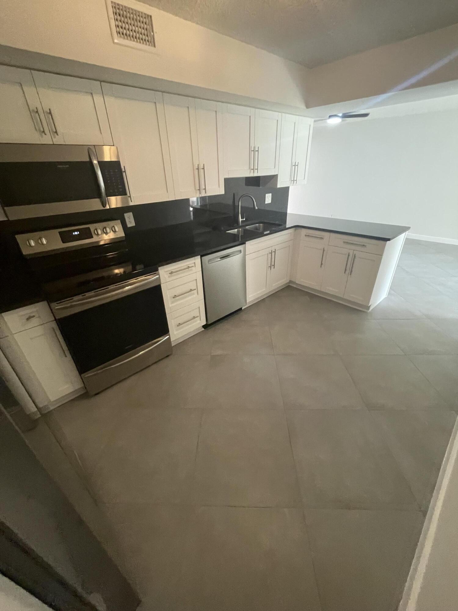 3355 Jaywood Terrace, Unit J113 Boca Raton, FL 33431 - Photo 7 of 44 IMG_9645