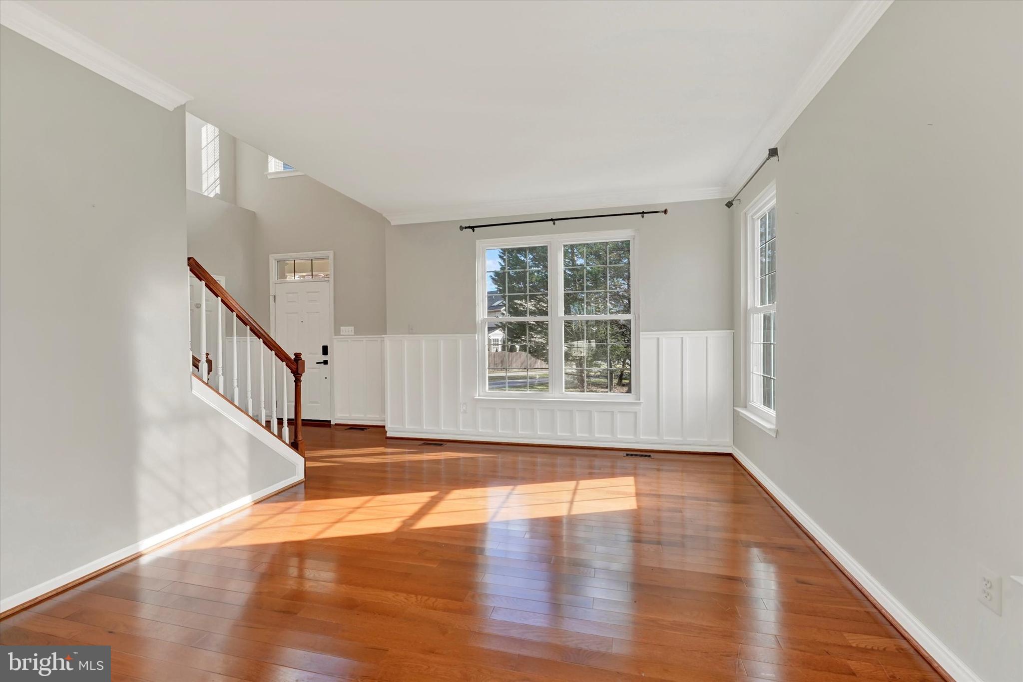 1590 Chapman Road Crofton, MD 21054 - Photo 17 of 70 a view of an entryway with wooden floor and stairs