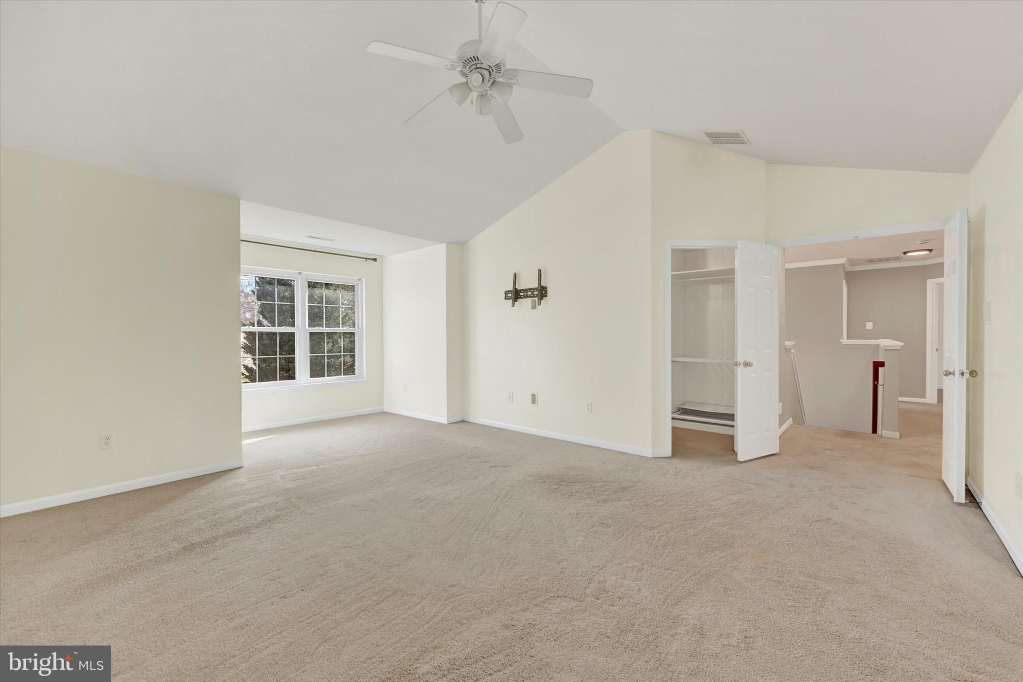 1590 Chapman Road Crofton, MD 21054 - Photo 21 of 70 a view of empty room with windows and ceiling fan