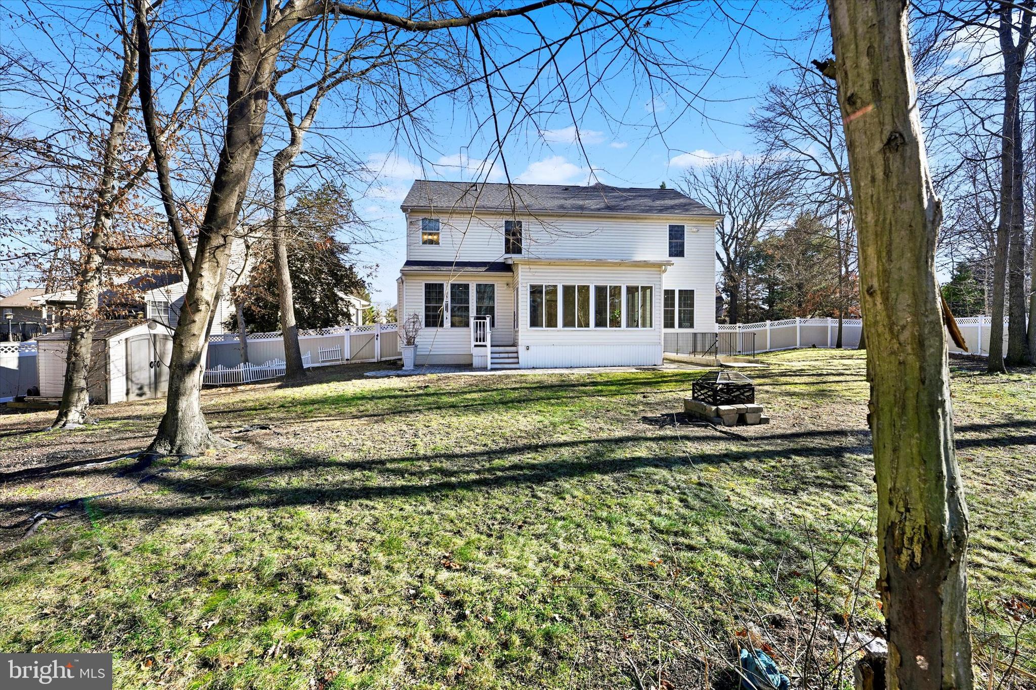 1590 Chapman Road Crofton, MD 21054 - Photo 40 of 70 a front view of a house with a yard