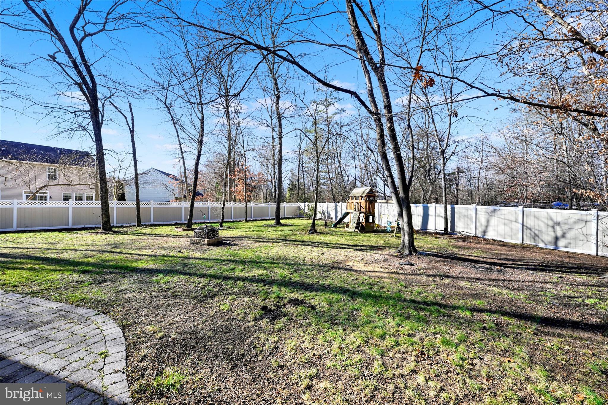 1590 Chapman Road Crofton, MD 21054 - Photo 41 of 70 a view of a backyard with large trees