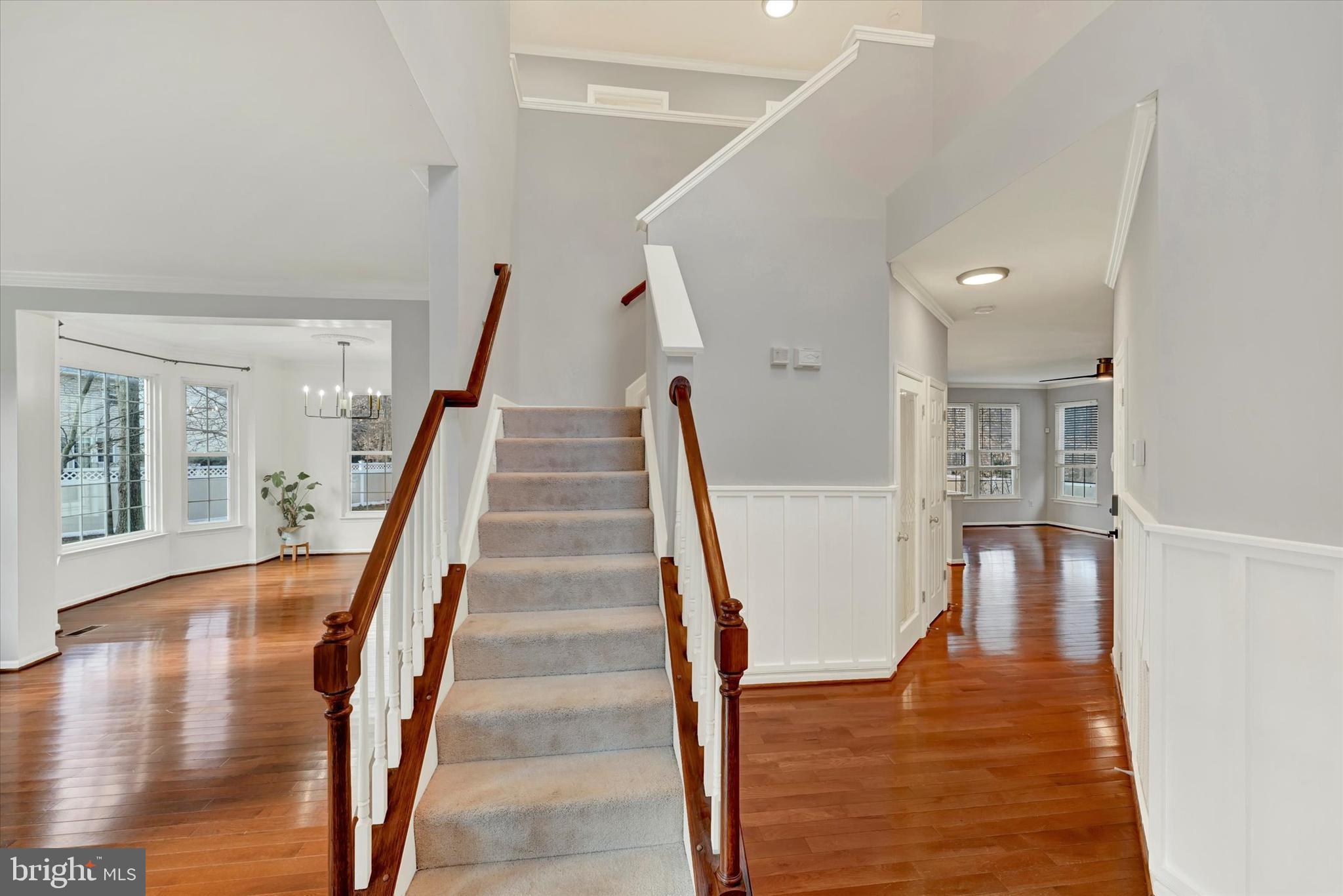 1590 Chapman Road Crofton, MD 21054 - Photo 5 of 70 a view of a hallway with wooden floor and staircase