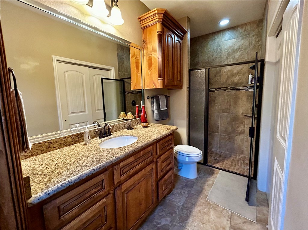 1310 Keenland Road Corpus Christi, TX 78418 - Photo 19 of 29 En suite to second primary bedroom