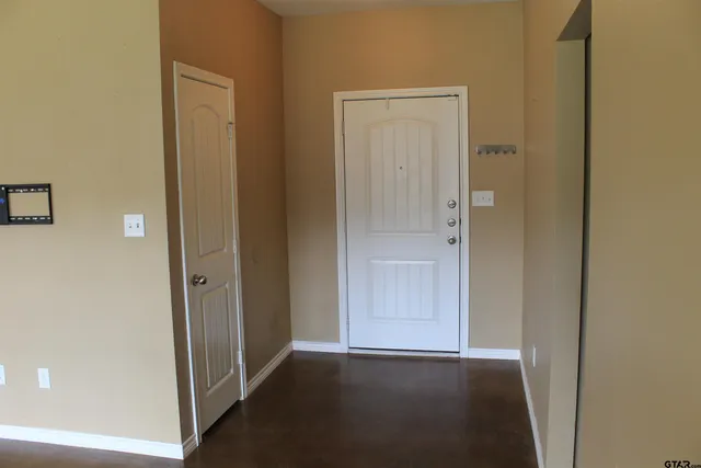 a kitchen with granite countertop a sink and a stove top oven