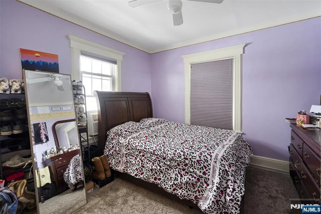 75 Pine Street Hackensack, NJ 07601 - Photo 13 of 23 a bedroom with bed and a window