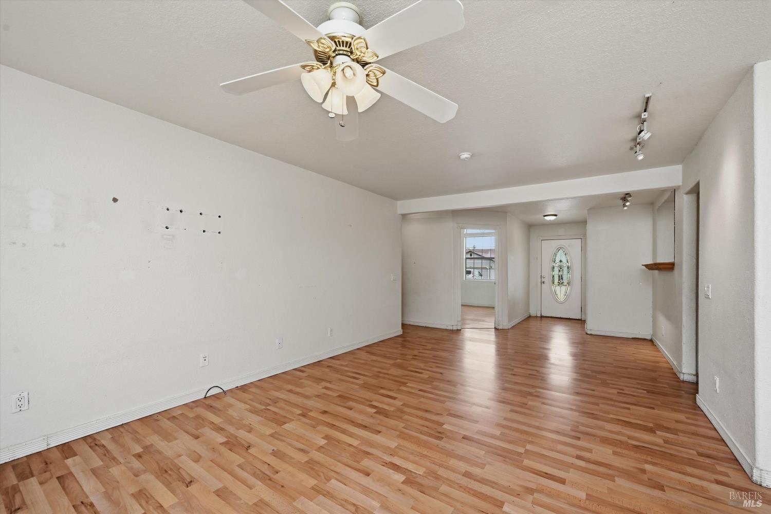 18057 Spyglass Road Hidden Valley Lake, CA 95467 - Photo 4 of 29 Living area looking toward entry hall.