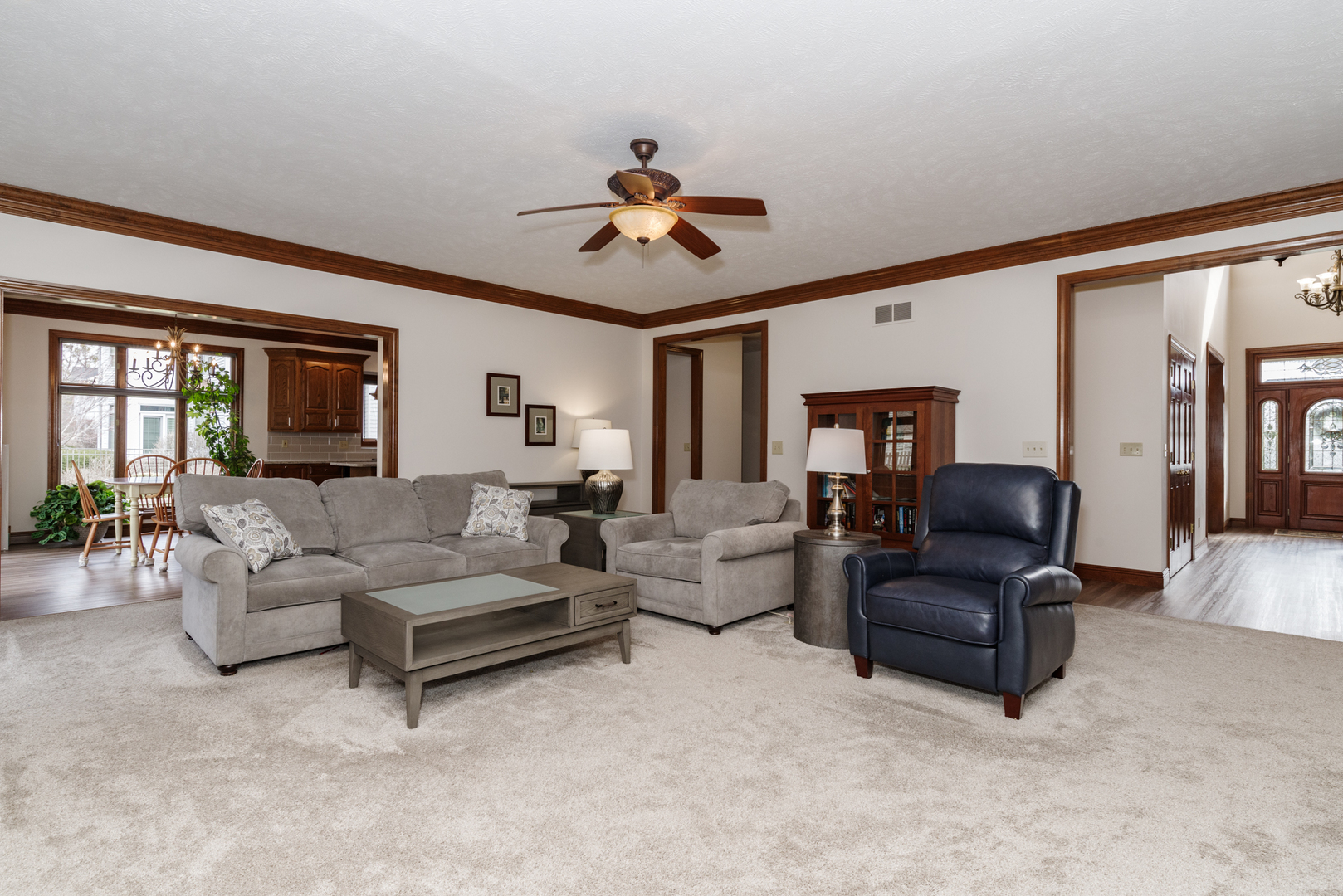 1908 Hackberry Road Bloomington, IL 61704 - Photo 12 of 50 a living room with furniture and a large window