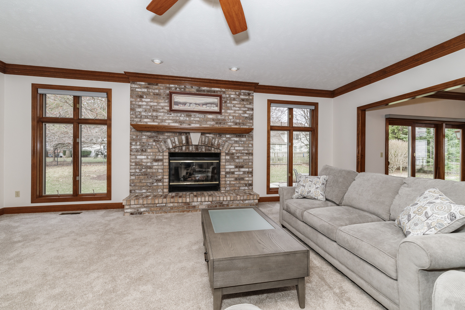 1908 Hackberry Road Bloomington, IL 61704 - Photo 13 of 50 a living room with furniture window and a fireplace