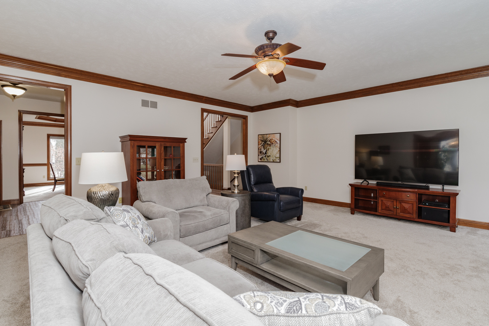 1908 Hackberry Road Bloomington, IL 61704 - Photo 14 of 50 a living room with furniture and a flat screen tv