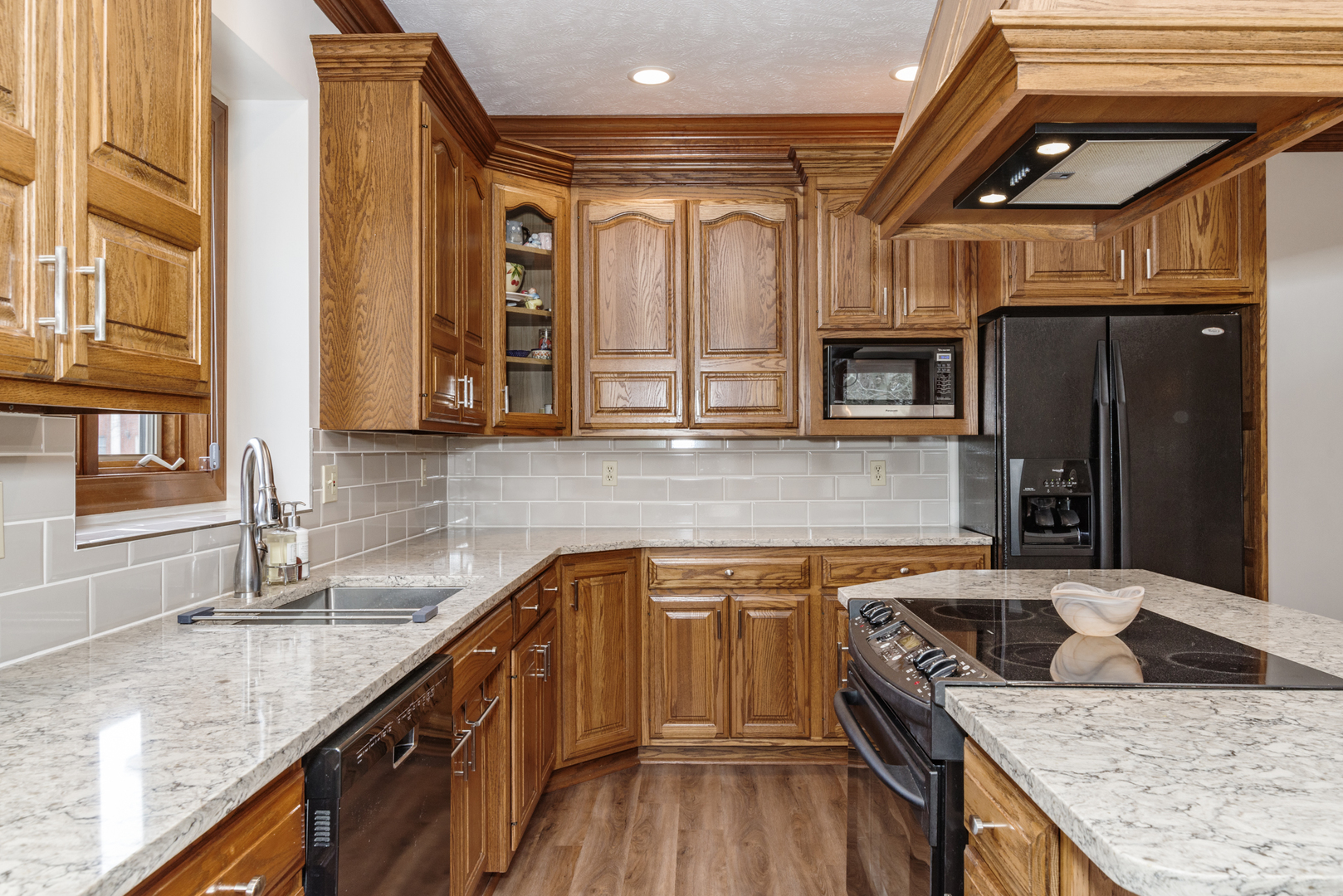 1908 Hackberry Road Bloomington, IL 61704 - Photo 16 of 50 a kitchen with a sink stove and cabinets