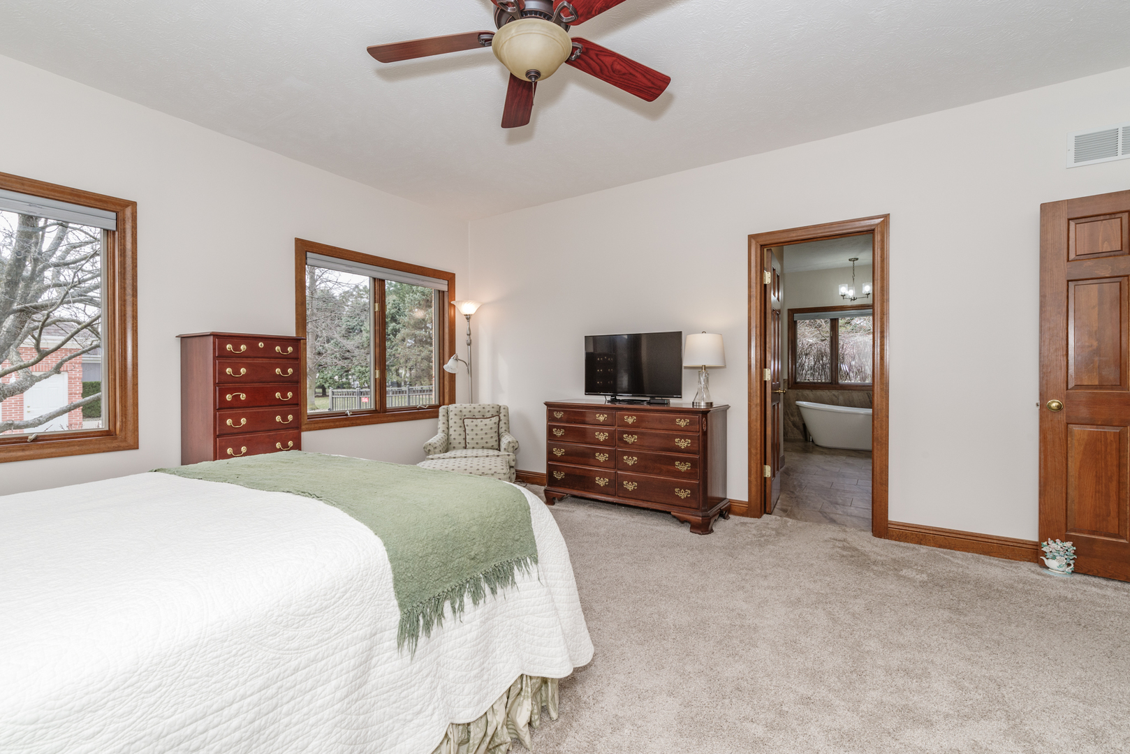 1908 Hackberry Road Bloomington, IL 61704 - Photo 22 of 50 a bedroom with a bed and a television