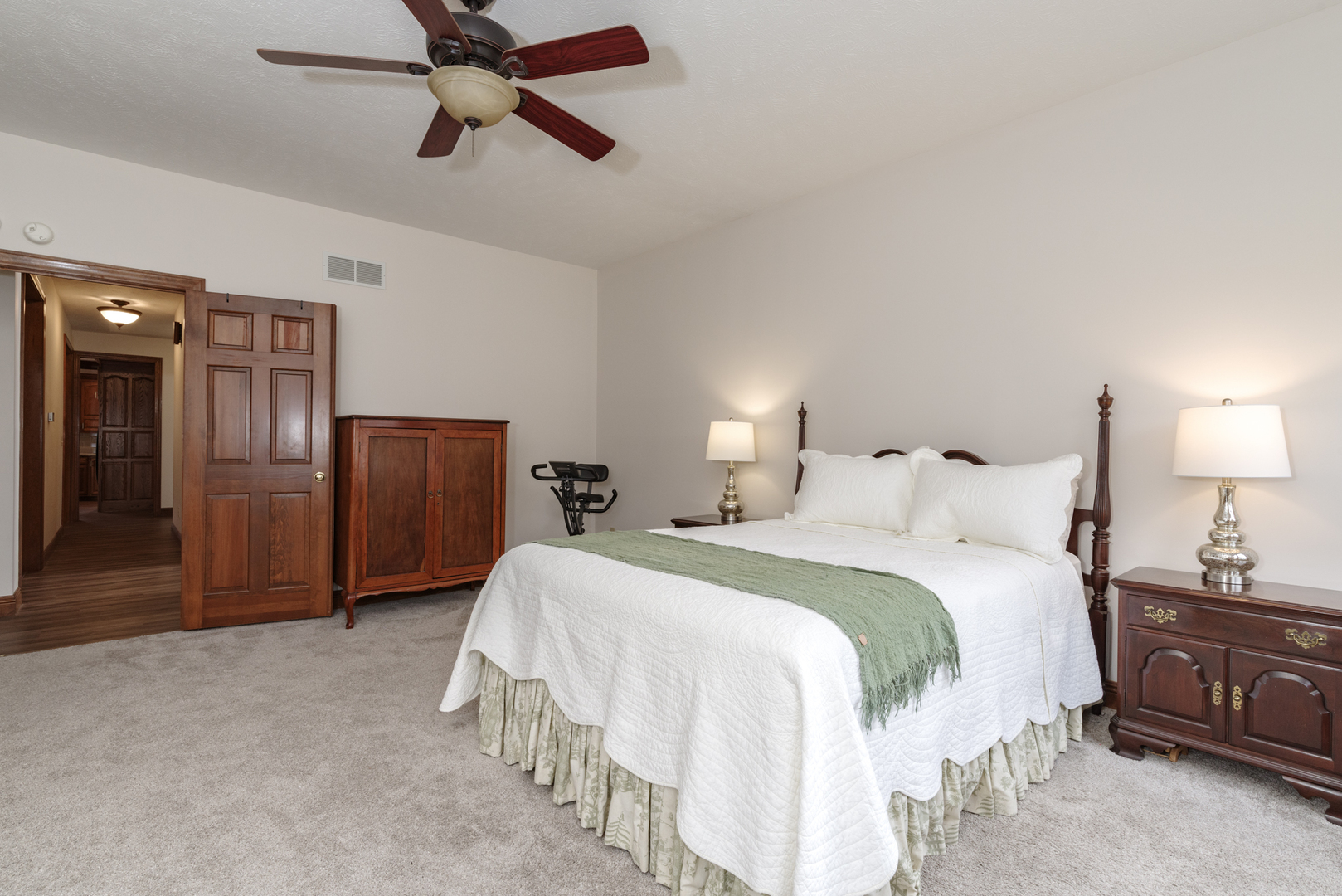 1908 Hackberry Road Bloomington, IL 61704 - Photo 23 of 50 a bedroom with a bed and cabinets