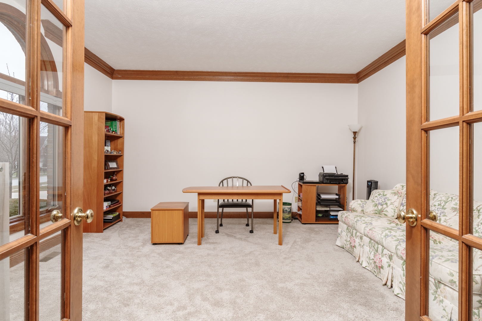 1908 Hackberry Road Bloomington, IL 61704 - Photo 26 of 50 a view of living room with furniture and floor to ceiling window