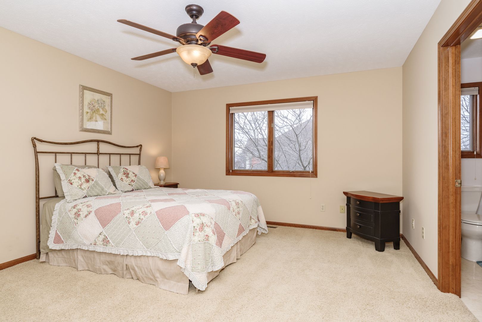 1908 Hackberry Road Bloomington, IL 61704 - Photo 30 of 50 a bedroom with a bed and a painting on the wall