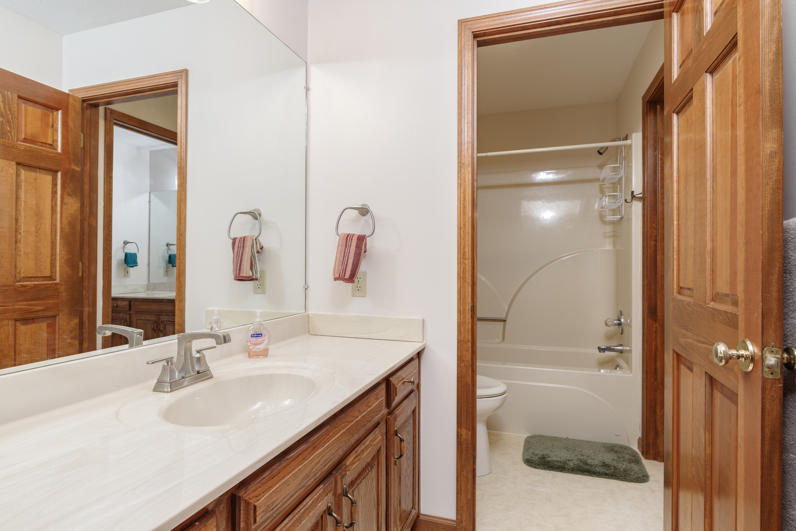 1908 Hackberry Road Bloomington, IL 61704 - Photo 32 of 50 a bathroom with a sink and a mirror